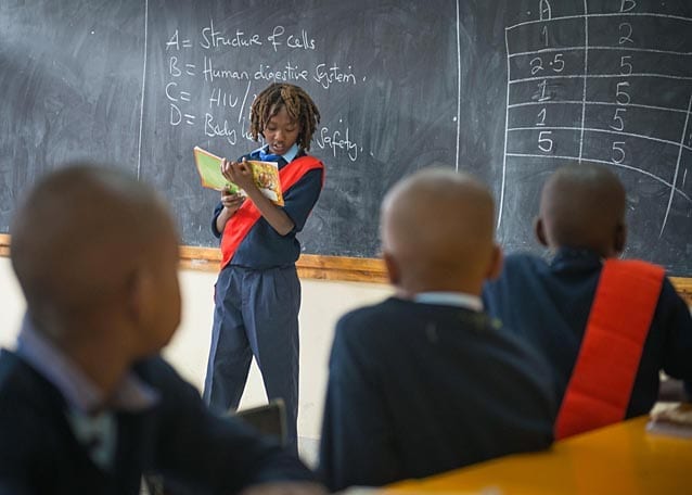 Monday morning at school: Peter reads to his classmates