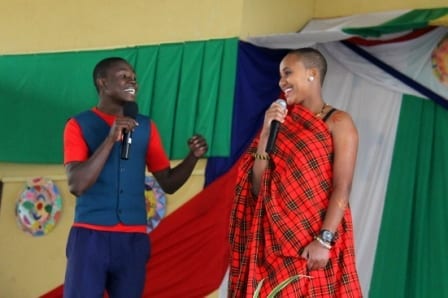 Two St Jude's students performing on stage at the event.