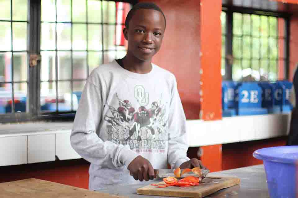 Edward volunteered in the kitchen