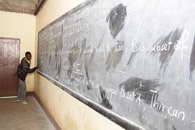 Learning experience: Justin is teaching maths at his local high school. "The materials are not enough," he said.