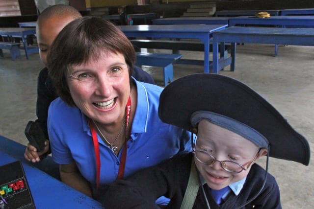 Making a difference: Vision Australia physiotherapist Louise Arvier was among the visitors who helped get essential equipment for Sebastian and Selemani.