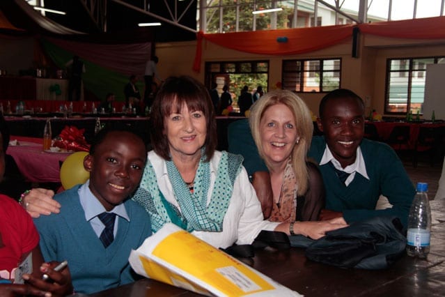 Pageturner: Longtime sponsor Margo Salmon (second from left) celebrated our first Form 6 graduation in Tanzania with us last year.