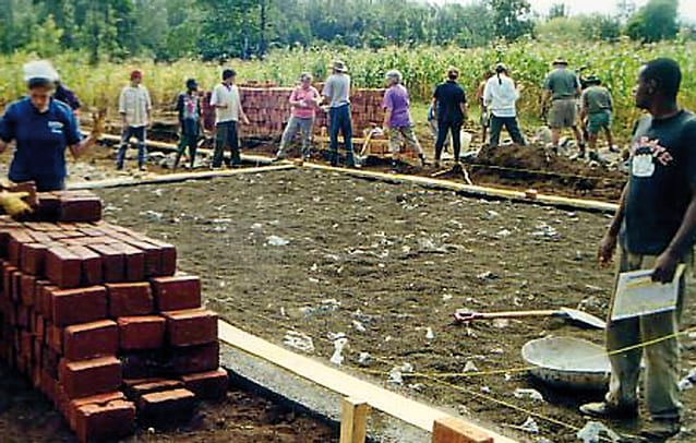 Strong foundations: Members of Rotary built the very first classroom at St Jude's and have been instrumental in the school's growth since the beginning.