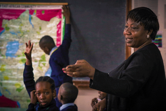 All mapped out: Eunice takes her class on a journey through East African geography.