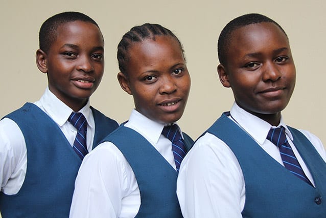 In good company: Rahel (center), with friends Elizabeth (left) and Hosiana, knows how important a quality education is and has been working hard during her Community Service Year to ensure her students benefit. 