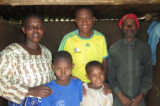 Where the heart is: Joseph, at home in Karutu with his family in 2013, knows what is important in life.