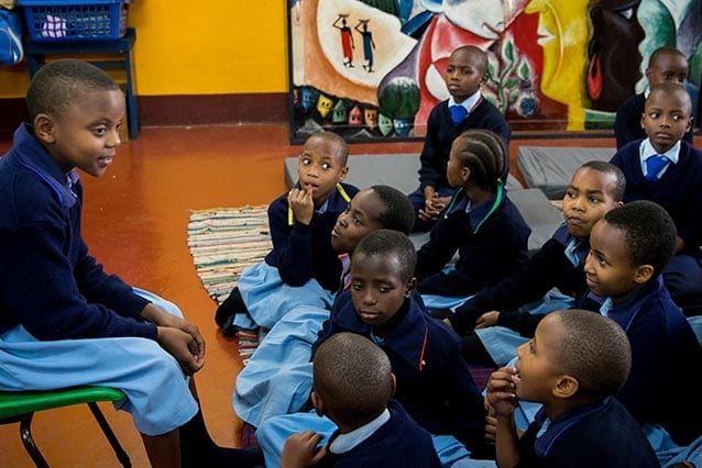 Bilingual bard: A Swahili story being told in English language.