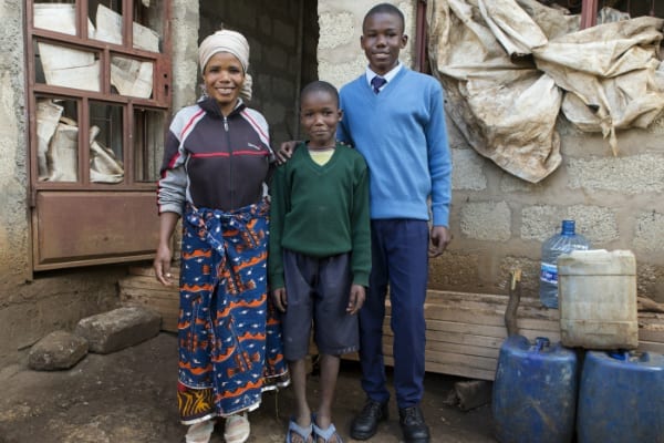 Renaissance man in the making: Isack helps his mother with duties around the house and helps tutor his younger brother.