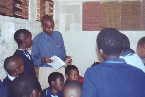 Decade on and still as dedicated: Mr Sebastian in class when he started at a much smaller St Jude's.