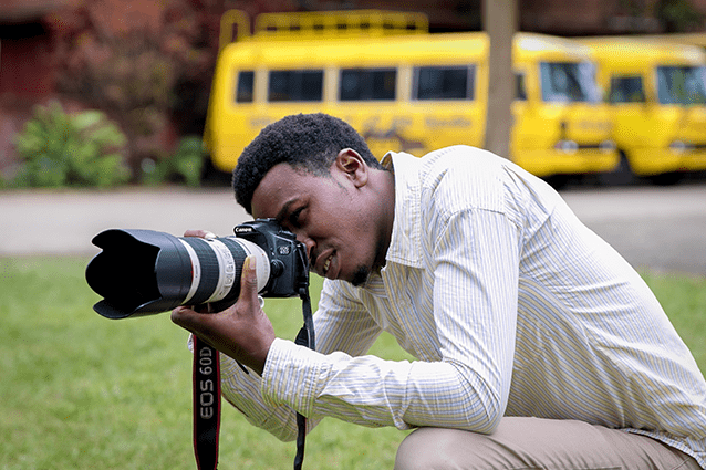 An eye for detail: Godluck frames a shot.