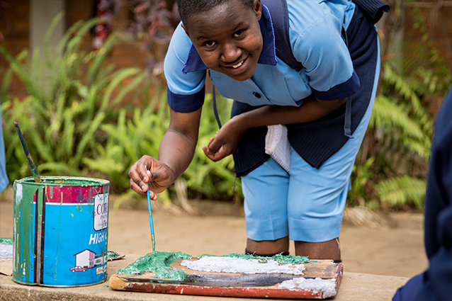 The gift of giving: Artworks created by our EarlyActers were given to “mother” Rotary club Arusha Mt Meru.