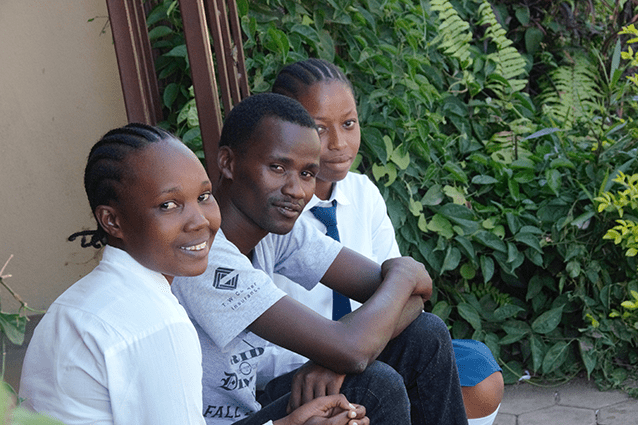 Leading the way: CSY intern Daudi organised the day to encourage the students he teaches at Njiro Secondary. He was also able to catch up with fellow St Jude’s students during the visit.