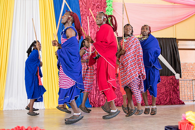 Jumping for joy: The graduation ceremony is a colourful event.