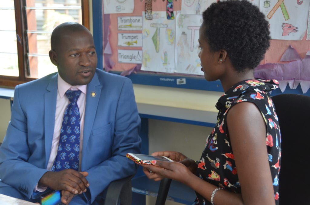 Leading the way: Miriam interviews District New Generations Chair, Francisco Ssemwanga.