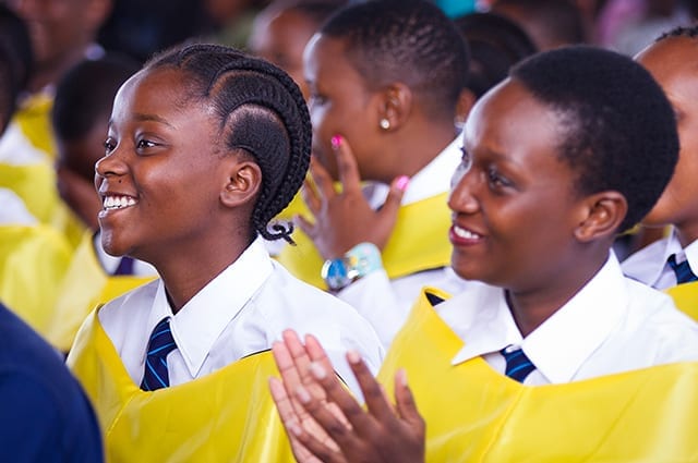 The future is bright:Graduates enjoying the ceremony together, knowing today is a new beginning!