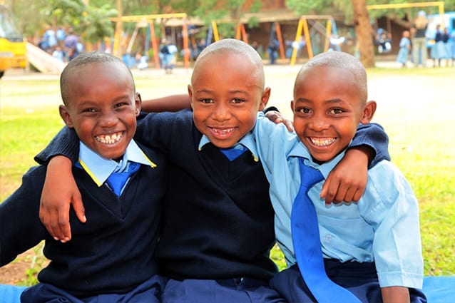 Studying hard, for everyone: Joseph and his friends at playtime, in his first year at St Jude's.