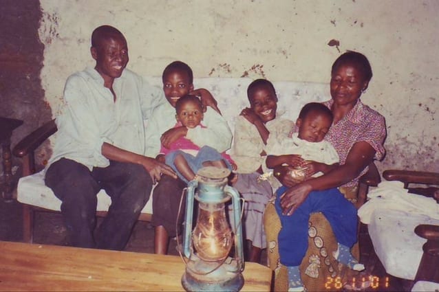 Family man: Renatus (middle, grinning) wanted to help his older brother recover from a persistent illness.