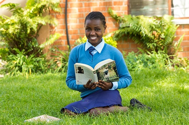 Reading the future: Jenifa enjoys studying hard so she can be a role model for African females.