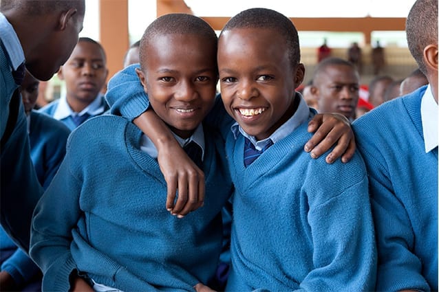 Buddies from the beginning: Isack (left) and Rajabu (right) on Cultural Day 2011. 