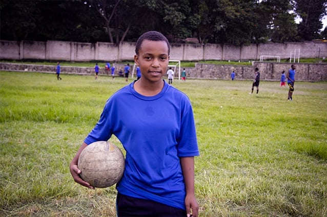 All her Glory: Amanda and Jennifer had the chance to meet newly sponsored student, Glory, at football!