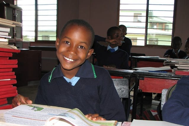 Smile for success: Lina, currently in her final year of secondary school, has benefited from 12 years of free education!