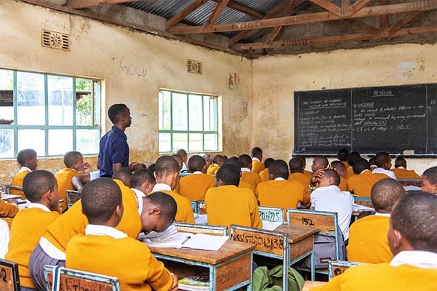 Giving back: Godwin is currently volunteer teaching at the secondary school he would have attended had he not been accepted into St Jude’s.