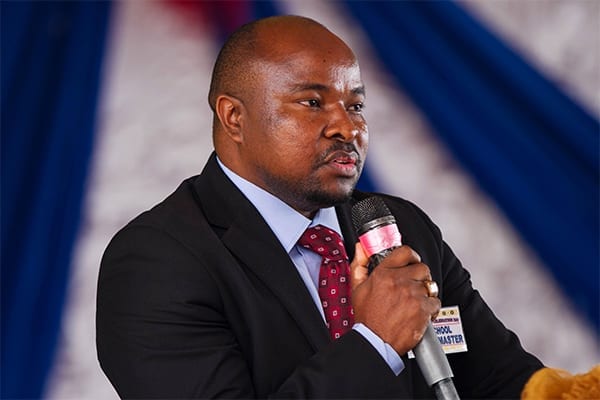 Creating change: Mr Mcharo addresses the Graduating Class during the Form 6 graduation ceremony last year.