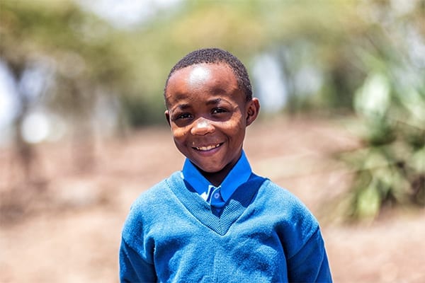 Life-changing Year: Edson stands strong ahead of his operation to help correct his painful knee condition.