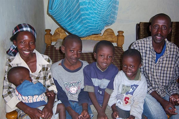 Humble Beginnings: Dastan with his family in their home at Lemara in 2012 when he was accepted into St Jude's.