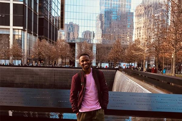 New York State of Mind: Enock in New York City where he studies at the University of Rochester, majoring in Finance and Economics.