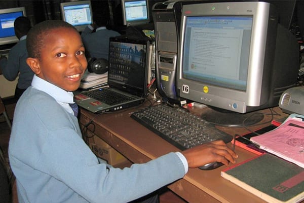 Humble beginnings: Enock studying at St Jude's in 2009.