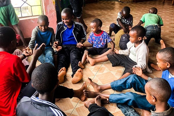 Heartwarming Smiles: After chores students spend time playing together, a highlight for all!