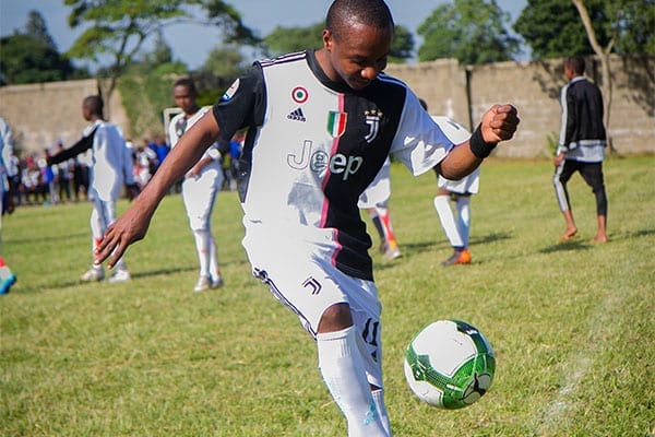 The Next Generation: Form 2 student and school team wingman, Yohana, works on his form at training after school.