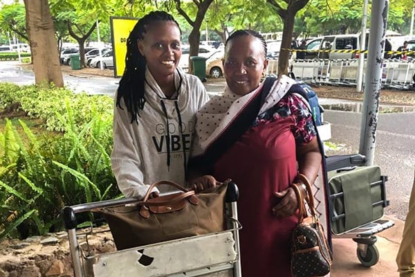 Major Milestone: Catherine with her mum at Kilimanjaro Airport as she leaves for Kenya.