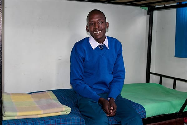 Staying At School: William settling into his new boarding room. 