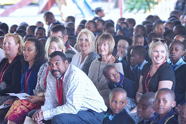 In the thick of it: Tina, Margo and Tara soak up the atmosphere at the primary assembly.