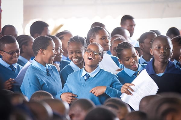 Hello sister: MLC students preparing to sing the Esther song in front of the class.