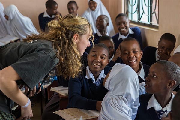 Having a laugh: An MLC student joking with the local students.