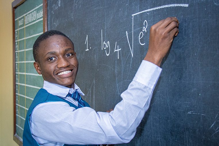 St-Jude-Student-wringing-on-black-board