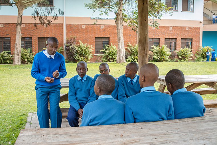 Form 6 students, enjoying a break with his schoolmates